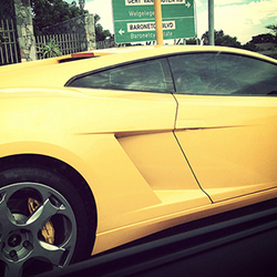 lamborghini at a traffic light